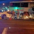 One dead, 4 hurt in Bloomington car and tour bus collision